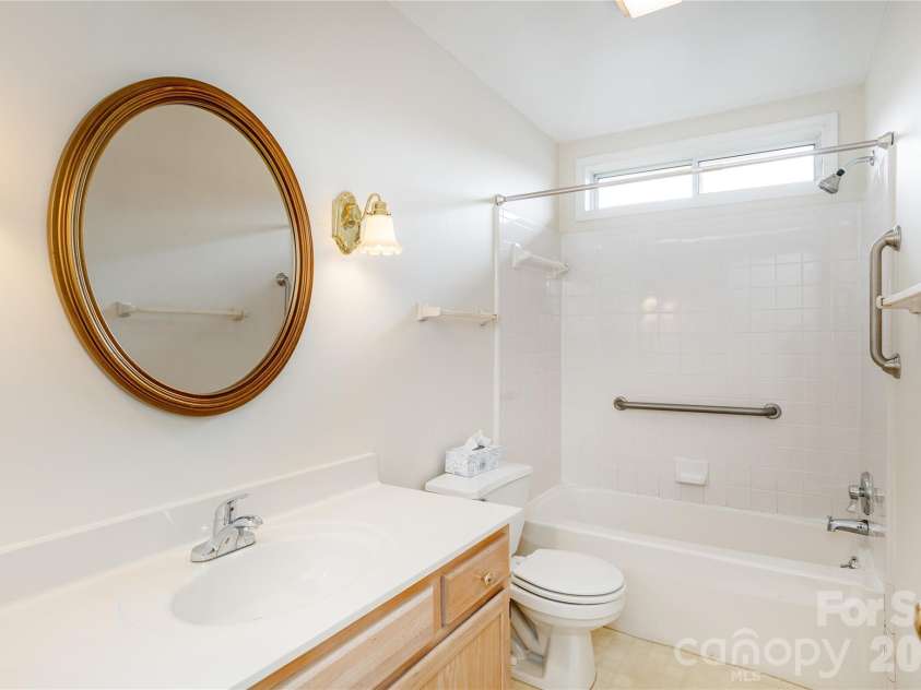 228 Dartcrest Drive, Hendersonville, NC 28792.  MLS# CAR4341599, YatesRealty ID 2279. Hall bath