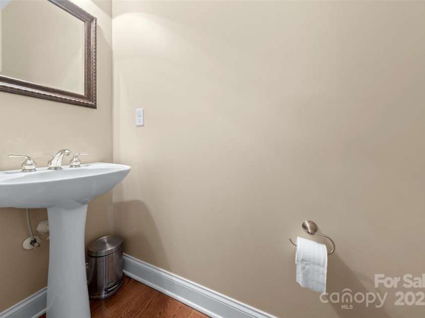 1119 Williamstown Road, Matthews, NC 28105.  MLS# CAR4271632, YatesRealty ID 22791. Half Bath off entry