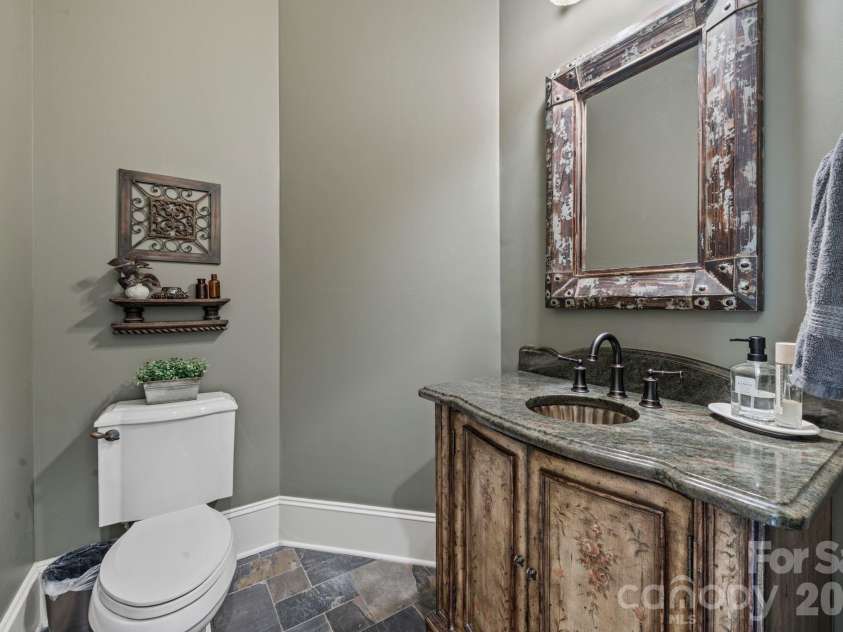 1812 Brawley School Road, Mooresville, NC 28117.  MLS# CAR4344998, YatesRealty ID 22791. Half bath on the main level