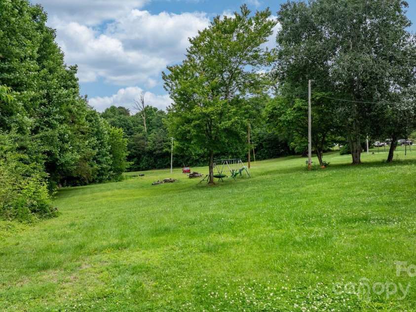 1691 Hill River Road, Hiddenite, NC 28636.  MLS# CAR4264524, YatesRealty ID 22792. 