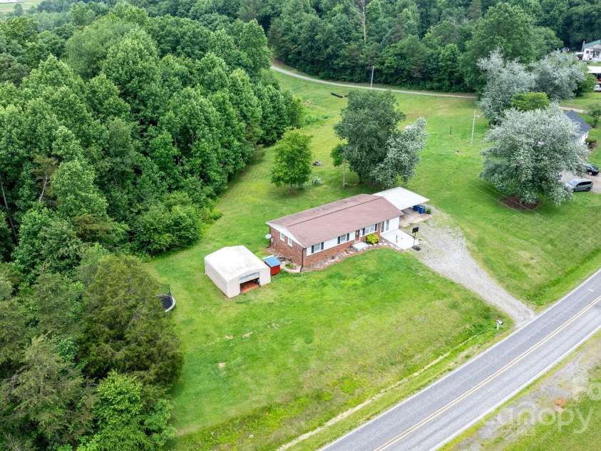 1691 Hill River Road, Hiddenite, NC 28636.  MLS# CAR4264524, YatesRealty ID 22792. 