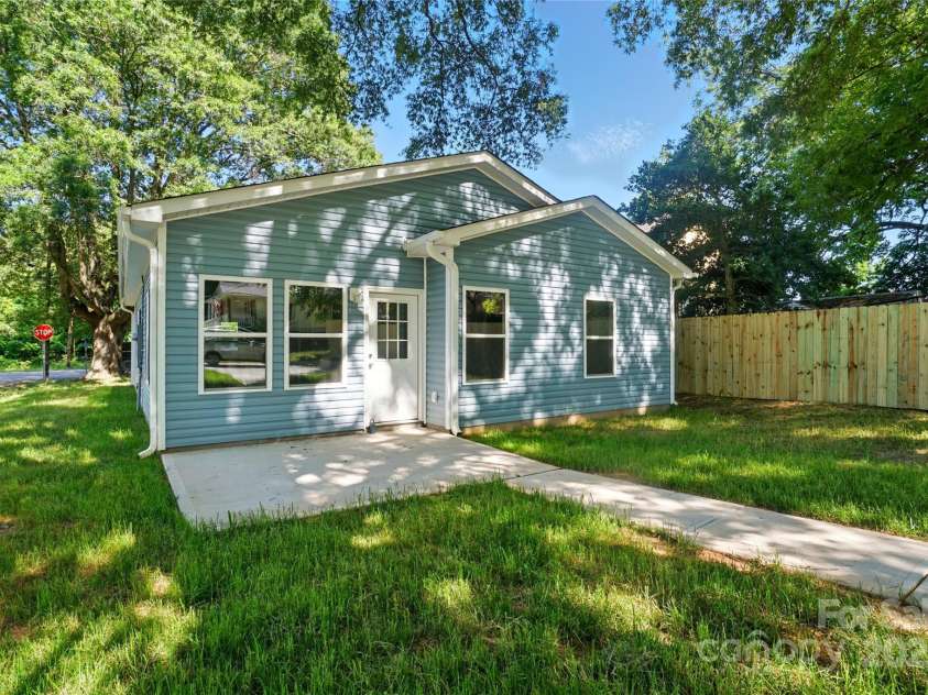 2313 Main Street, Kannapolis, NC 28081.  MLS# CAR4232868, YatesRealty ID 22796. Spacious Backyard with back patio, large driveway, and privacy fence
