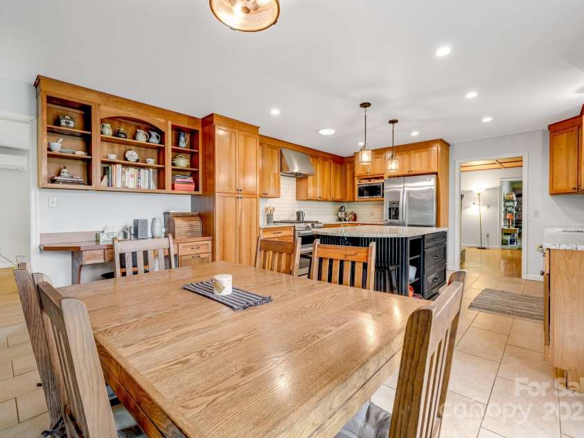 6334 Jacks Creek Road, Burnsville, NC 28714.  MLS# CAR4259403, YatesRealty ID 22798. Breakfast area.