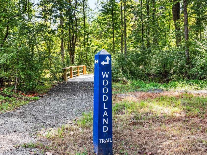 3034 Finchborough Court, Charlotte, NC 28269.  MLS# CAR4260919, YatesRealty ID 22799. Miles of Natural walking trails within the community