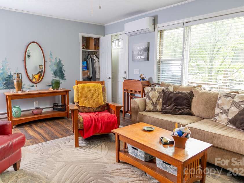 57 Gribble Road, Franklin, NC 28734.  MLS# CAR4253647, YatesRealty ID 228. Beautiful Paiinted wall in Living Room