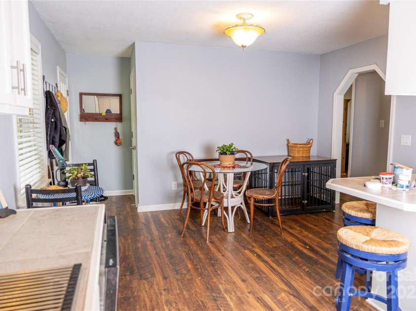 57 Gribble Road, Franklin, NC 28734.  MLS# CAR4253647, YatesRealty ID 228. Entrance from outside to Kitchen and Basement Door