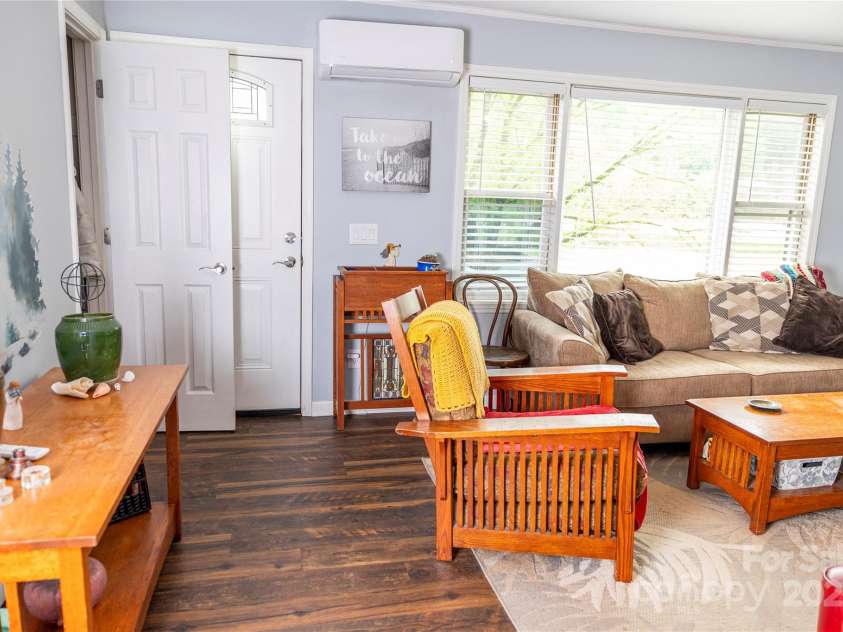 57 Gribble Road, Franklin, NC 28734.  MLS# CAR4253647, YatesRealty ID 228. Front Entrance from Deck to Living Room