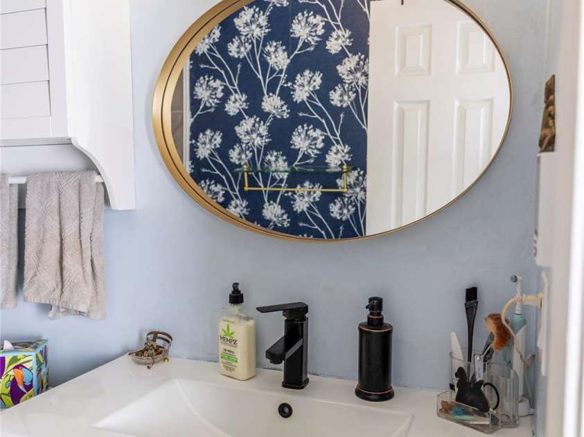 57 Gribble Road, Franklin, NC 28734.  MLS# CAR4253647, YatesRealty ID 228. New Vanity and Mirror in Hallway Bathroom