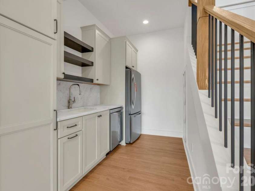 380 Greystone Drive, Boone, NC 28607.  MLS# CAR4367941, YatesRealty ID 22800. Kitchenette off lower-level living room