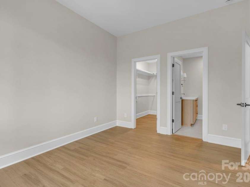 380 Greystone Drive, Boone, NC 28607.  MLS# CAR4367941, YatesRealty ID 22800. Lower-level bedroom suite 1