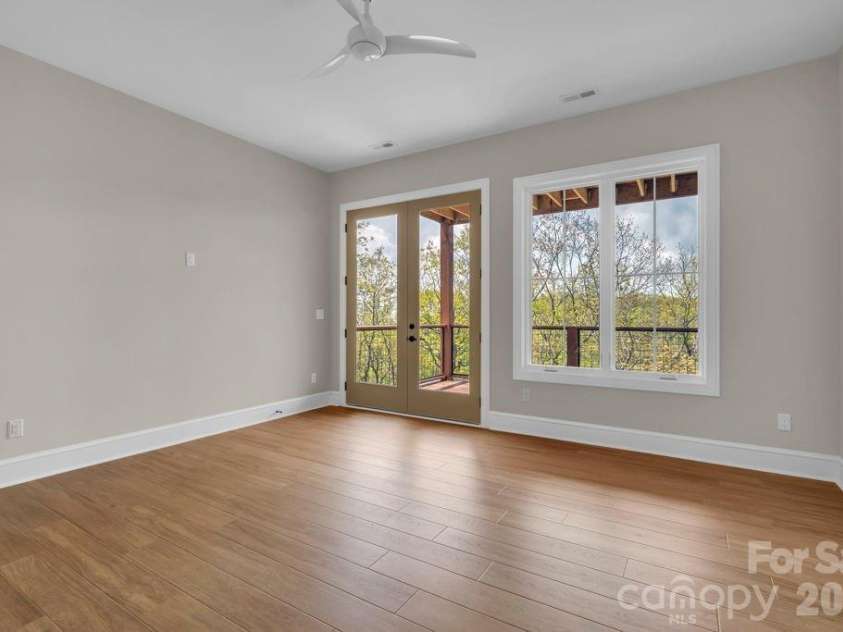 380 Greystone Drive, Boone, NC 28607.  MLS# CAR4367941, YatesRealty ID 22800. Lower-level bedroom suite 2