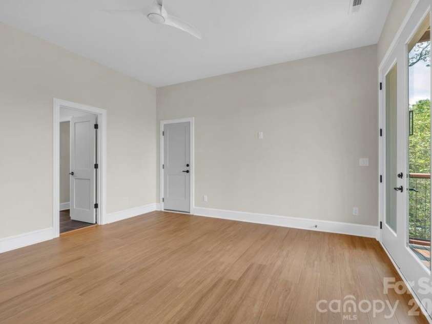 380 Greystone Drive, Boone, NC 28607.  MLS# CAR4367941, YatesRealty ID 22800. Lower-level bedroom suite 2