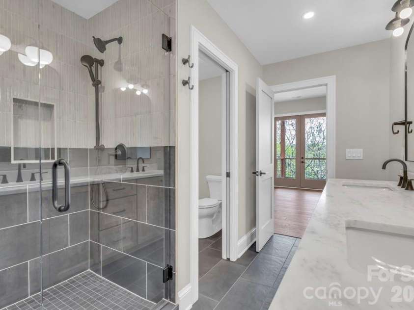 380 Greystone Drive, Boone, NC 28607.  MLS# CAR4367941, YatesRealty ID 22800. Lower-level bedroom suite 2