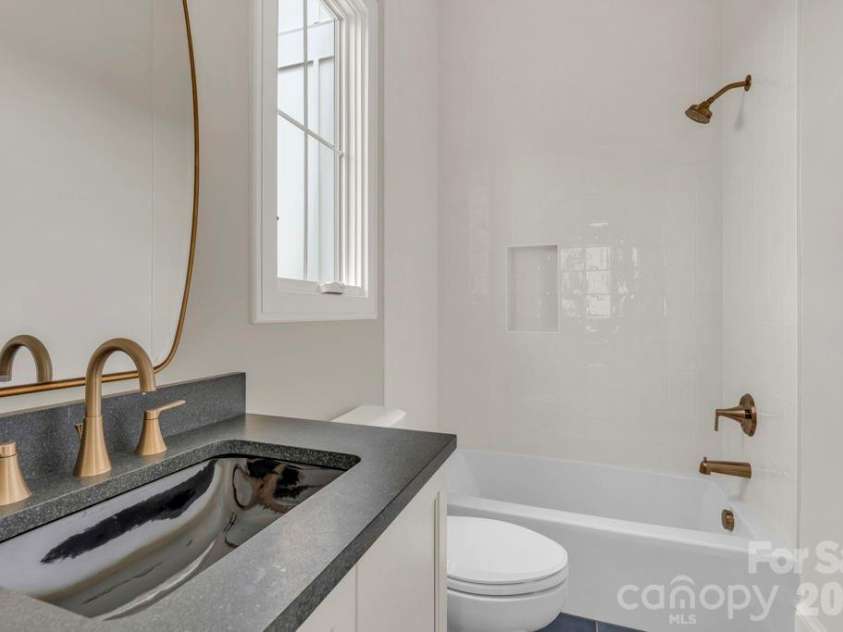 380 Greystone Drive, Boone, NC 28607.  MLS# CAR4367941, YatesRealty ID 22800. Main-level 2nd office bath