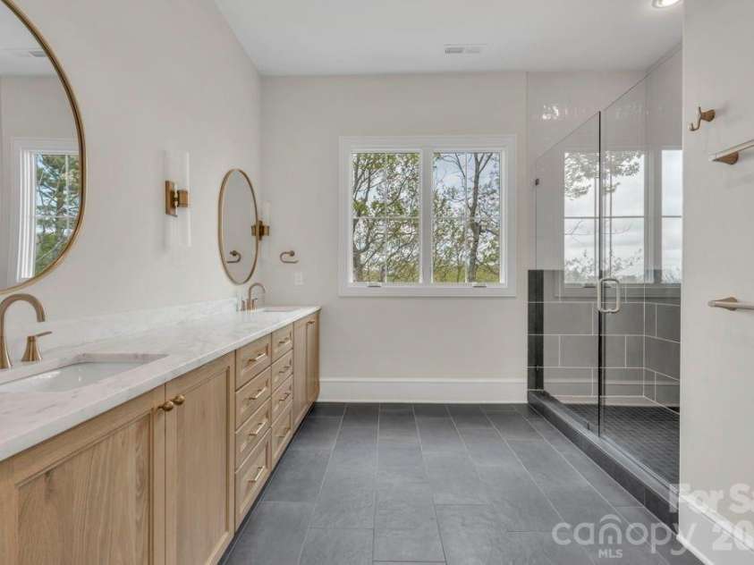380 Greystone Drive, Boone, NC 28607.  MLS# CAR4367941, YatesRealty ID 22800. Main-level primary suite