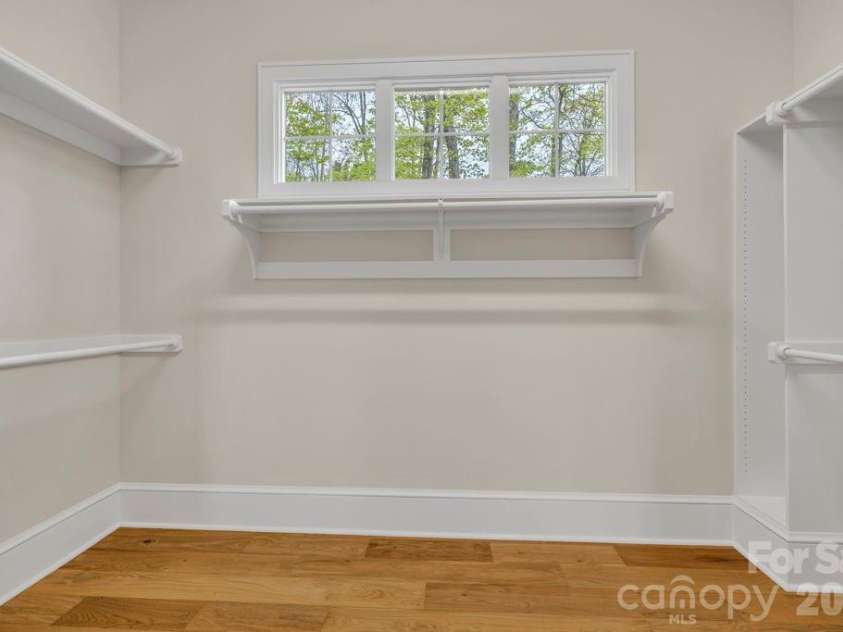 380 Greystone Drive, Boone, NC 28607.  MLS# CAR4367941, YatesRealty ID 22800. Main-level primary suite