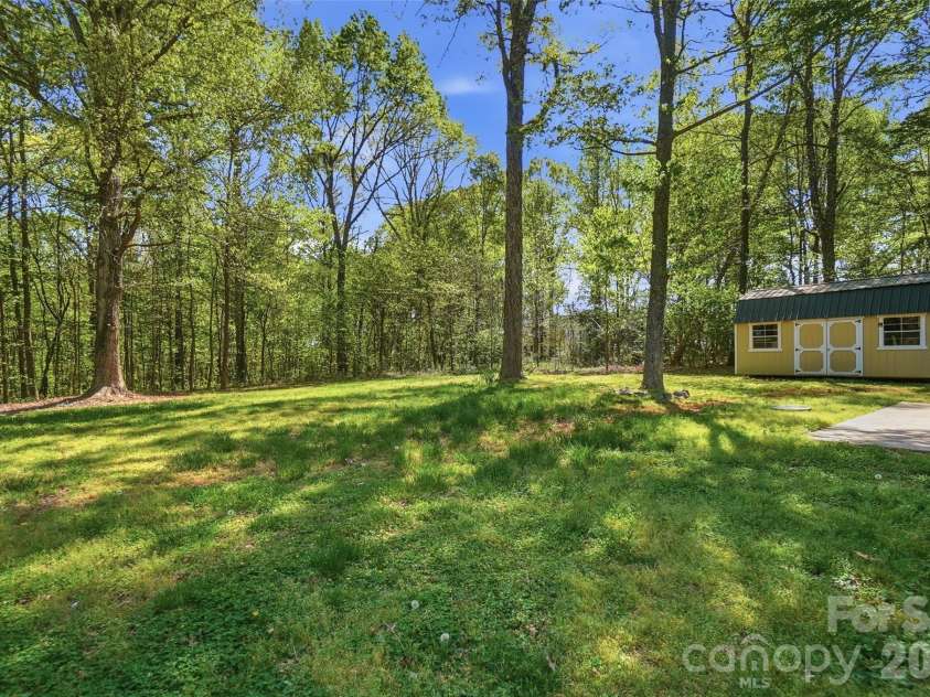 4415 Potter Road, Monroe, NC 28112.  MLS# CAR4364056, YatesRealty ID 22803. Rear yard & storage shed