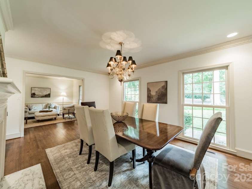 532 Courtney Lane, Matthews, NC 28105.  MLS# CAR4252271, YatesRealty ID 22805. Gracious Dining Room looking into the Living Room