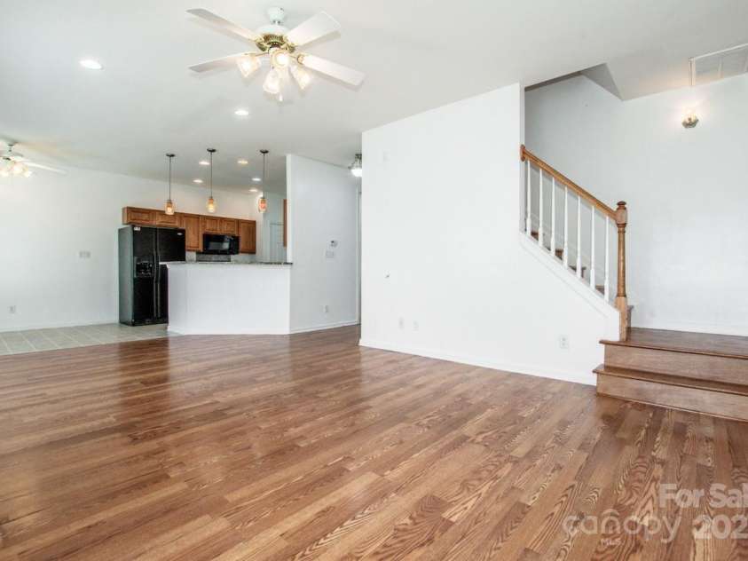 198 Devon Forest Drive, Mooresville, NC 28115.  MLS# CAR4275077, YatesRealty ID 22807. Great Room/Stairs