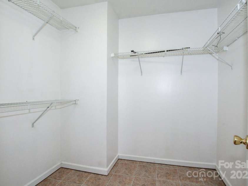 198 Devon Forest Drive, Mooresville, NC 28115.  MLS# CAR4275077, YatesRealty ID 22807. Owner's walk-in closet