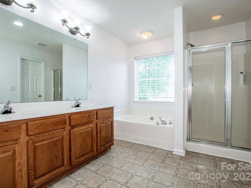 198 Devon Forest Drive, Mooresville, NC 28115.  MLS# CAR4275077, YatesRealty ID 22807. Primary Bathroom
