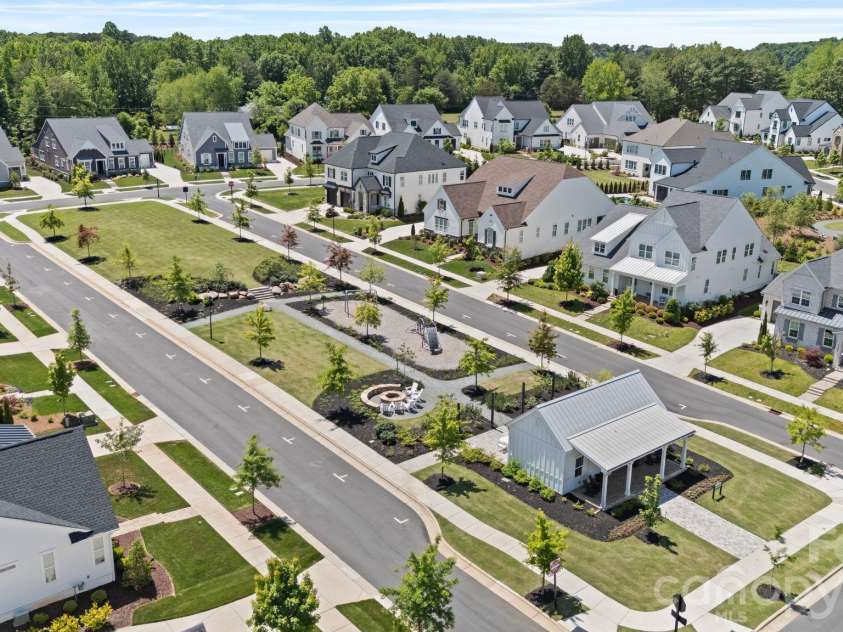 14109 Pinoli Pine Circle, Huntersville, NC 28078.  MLS# CAR4375355, YatesRealty ID 22809. Community playground &  firepit