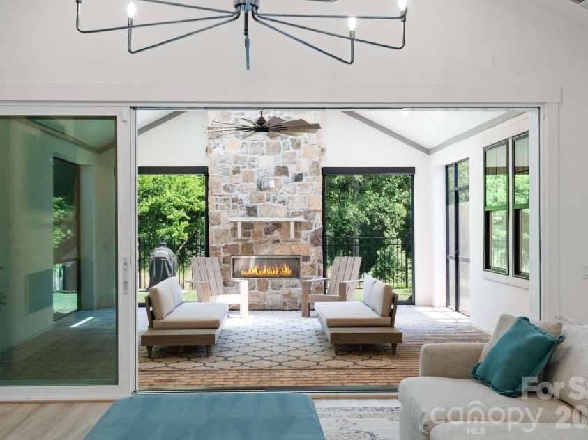 14109 Pinoli Pine Circle, Huntersville, NC 28078.  MLS# CAR4375355, YatesRealty ID 22809. Screened in porch