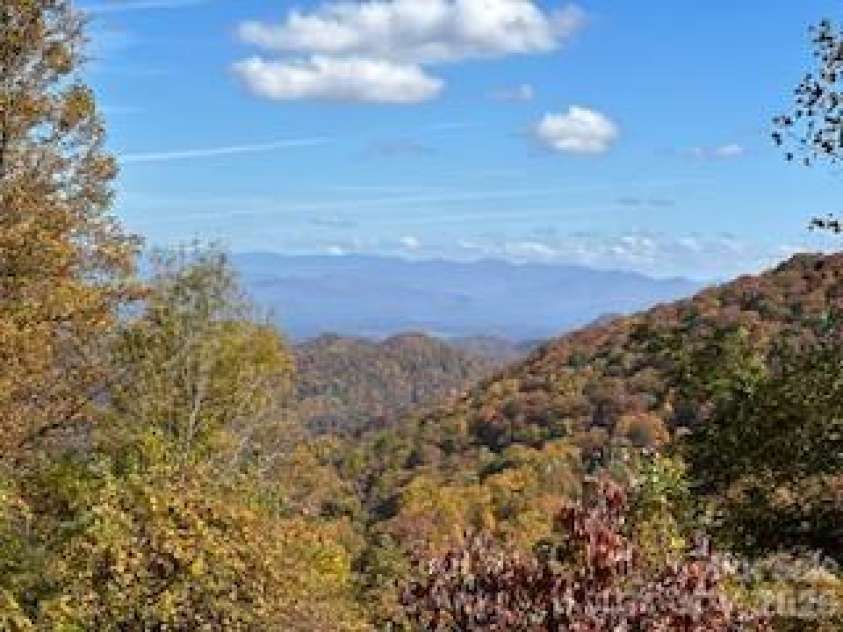 580 Freemont Drive, Leicester, NC 28748.  MLS# CAR4057787, YatesRealty ID 2281. Million Dollar Views!