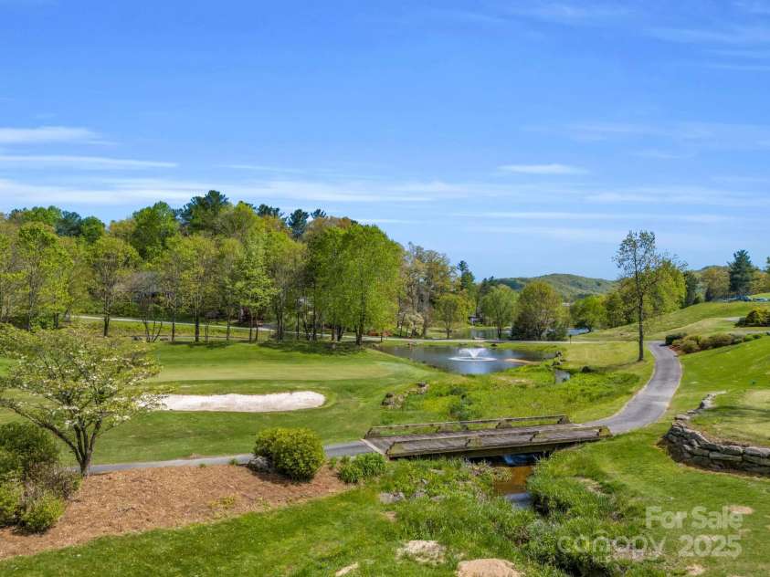 91 Triple Fairways Drive, Hendersonville, NC 28739.  MLS# CAR4265279, YatesRealty ID 22810. 