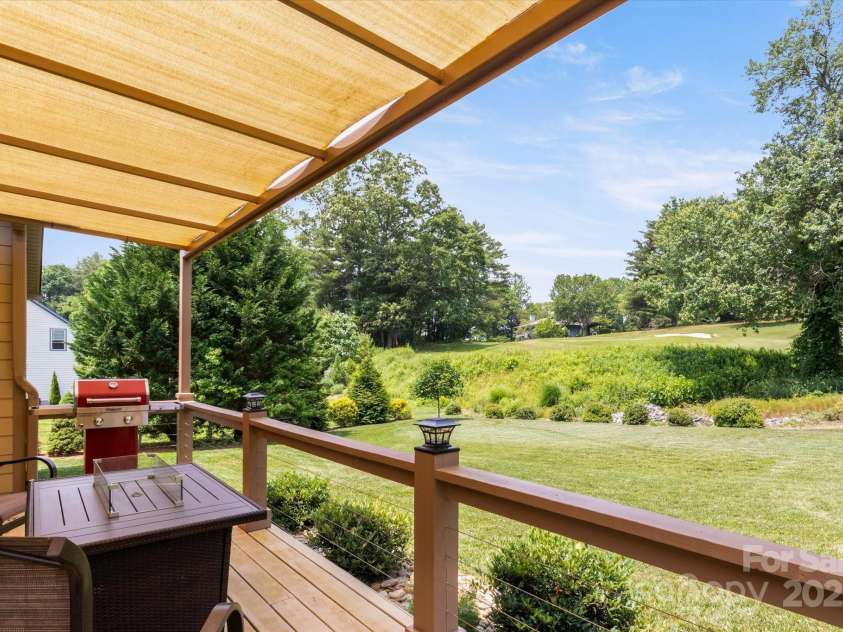91 Triple Fairways Drive, Hendersonville, NC 28739.  MLS# CAR4265279, YatesRealty ID 22810. 