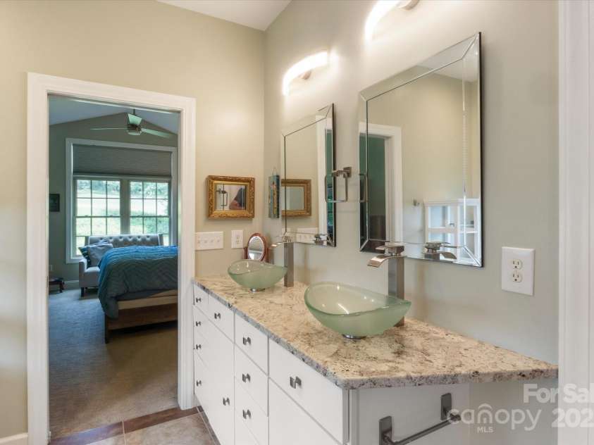 91 Triple Fairways Drive, Hendersonville, NC 28739.  MLS# CAR4265279, YatesRealty ID 22810. Beautiful Double Vessel Glass Bowl Sinks