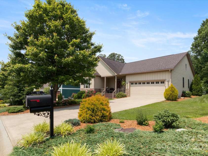 91 Triple Fairways Drive, Hendersonville, NC 28739.  MLS# CAR4265279, YatesRealty ID 22810. Easy to Maintain Lawn