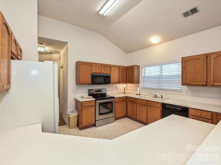 5607 Oak Drive, Charlotte, NC 28216.  MLS# CAR4291092, YatesRealty ID 22814. 