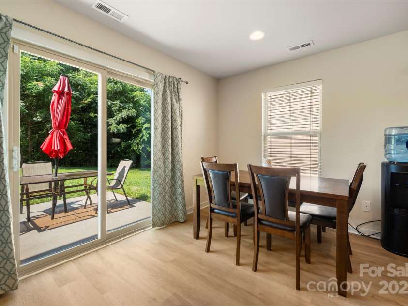 4732 Gibbons Link Road, Charlotte, NC 28269.  MLS# CAR4273619, YatesRealty ID 22817. Dining area with sliding glass door