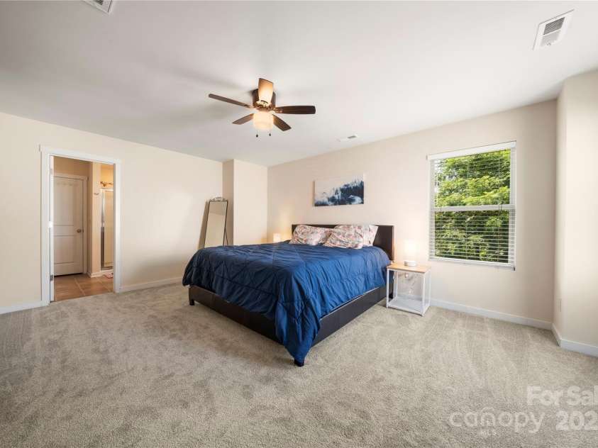 4732 Gibbons Link Road, Charlotte, NC 28269.  MLS# CAR4273619, YatesRealty ID 22817. Primary bedroom