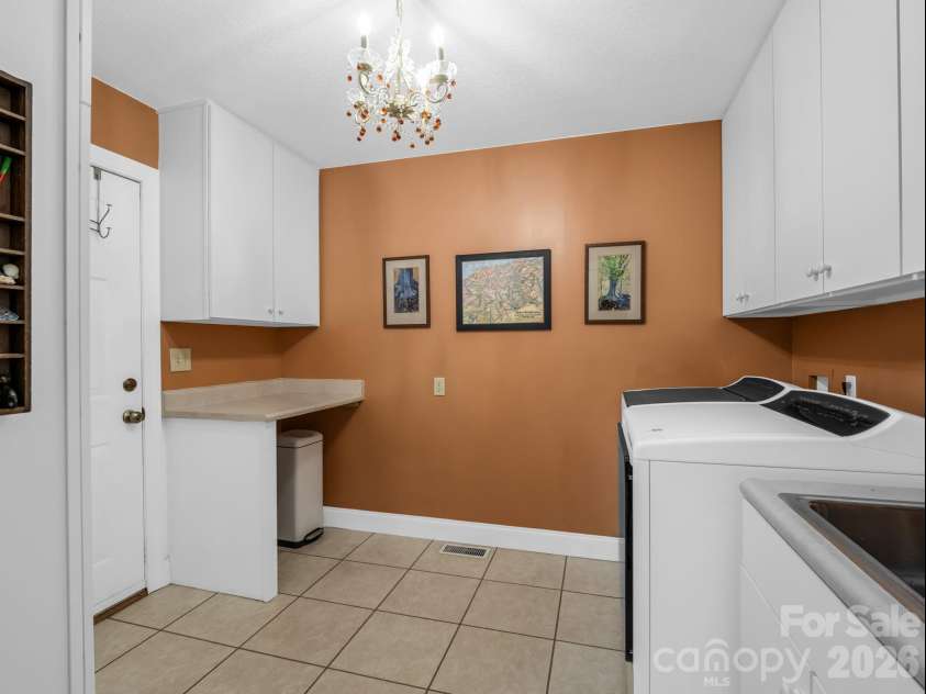 425 Winesap Boulevard, Lake Lure, NC 28746.  MLS# CAR4372379, YatesRealty ID 22818. Laundry room main floor
