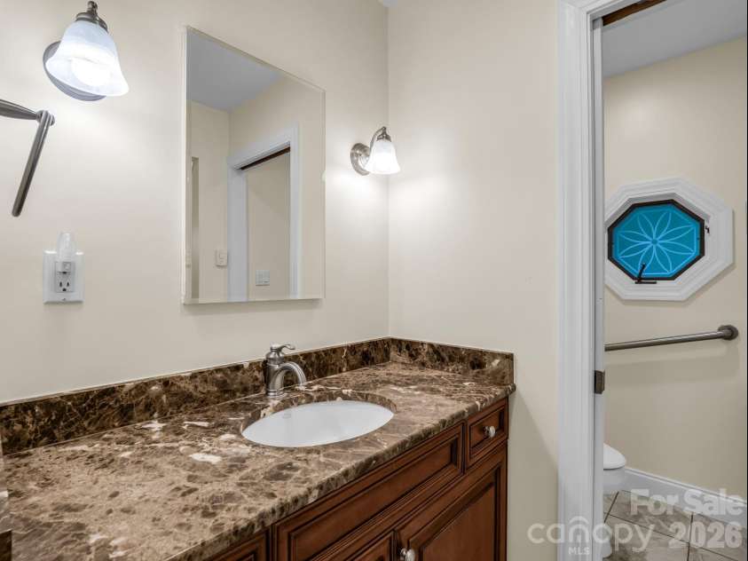 425 Winesap Boulevard, Lake Lure, NC 28746.  MLS# CAR4372379, YatesRealty ID 22818. Primary ensuite main floor