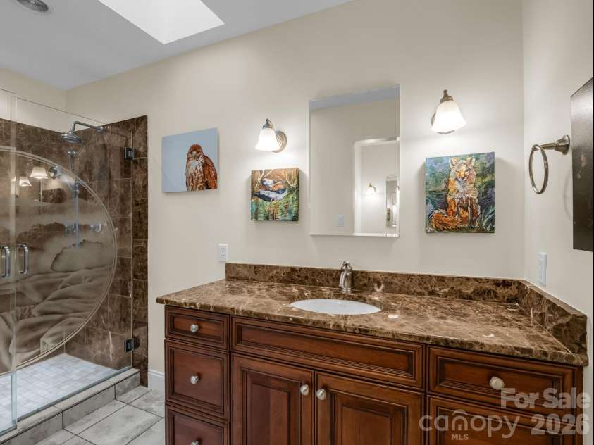 425 Winesap Boulevard, Lake Lure, NC 28746.  MLS# CAR4372379, YatesRealty ID 22818. Primary ensuite main floor