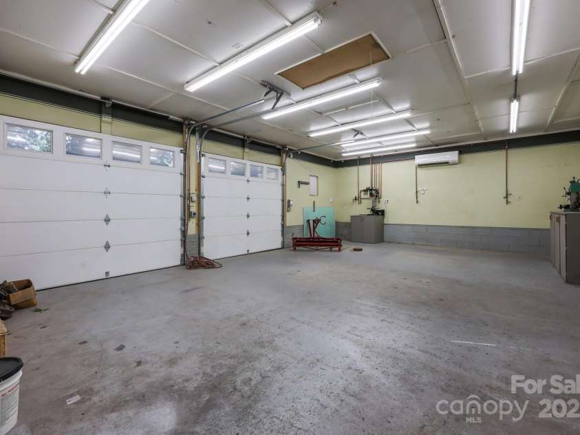 201 Scalybark Trail, Concord, NC 28027.  MLS# CAR4257946, YatesRealty ID 22820. Garage/shop