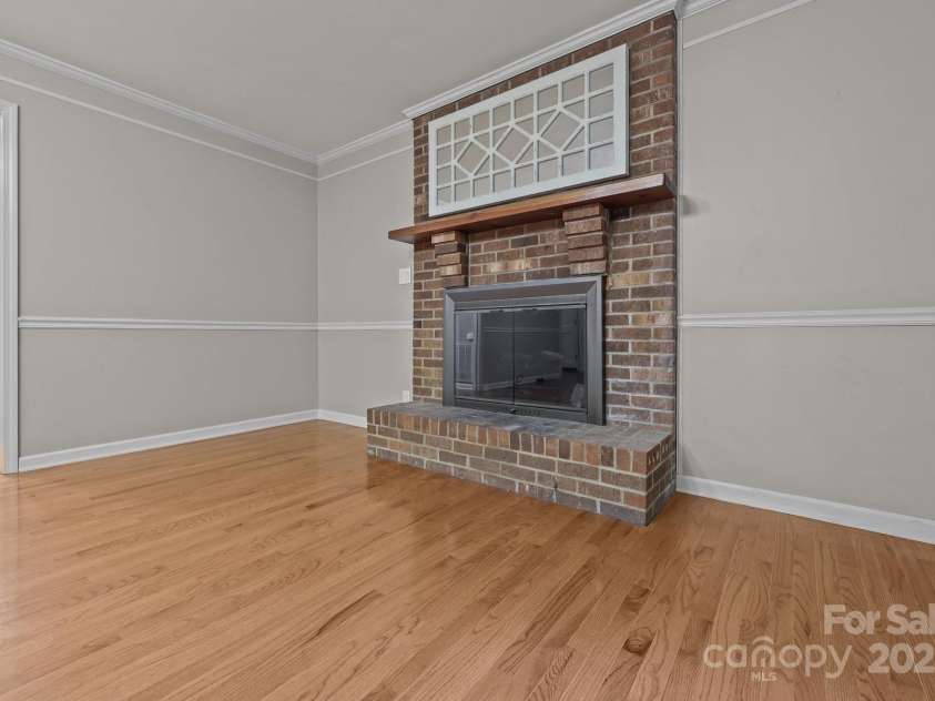 201 Scalybark Trail, Concord, NC 28027.  MLS# CAR4257946, YatesRealty ID 22820. Living room