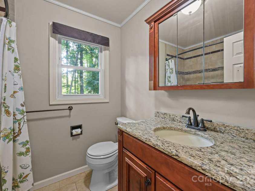 201 Scalybark Trail, Concord, NC 28027.  MLS# CAR4257946, YatesRealty ID 22820. Secondary bath