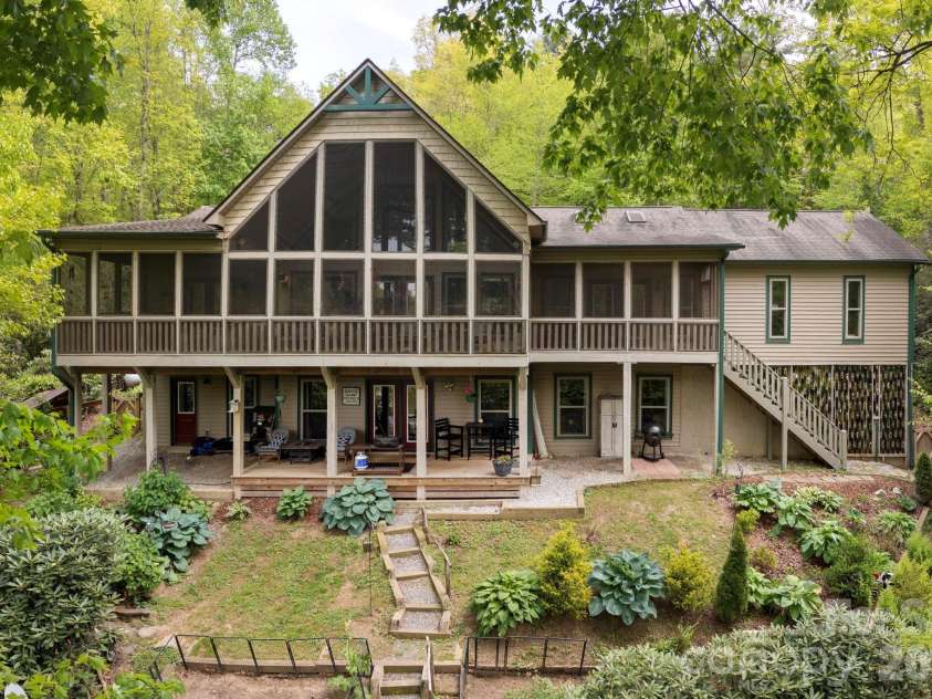 149 Hiwassee Road, Lake Toxaway, NC 28747.  MLS# CAR4377735, YatesRealty ID 22821. 149 Indian Lake Estates