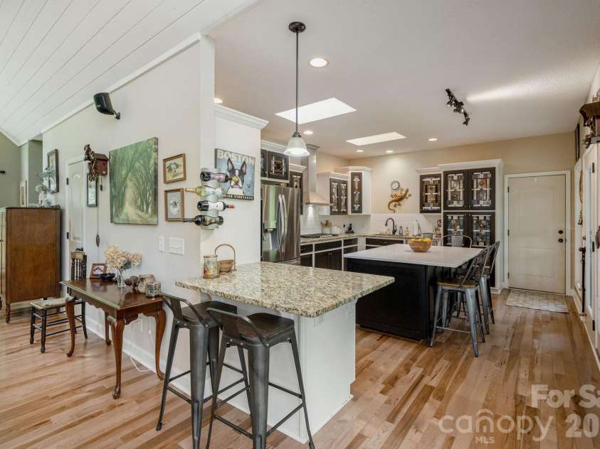 149 Hiwassee Road, Lake Toxaway, NC 28747.  MLS# CAR4377735, YatesRealty ID 22821. Breakfast bar and separate island