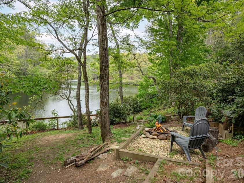 149 Hiwassee Road, Lake Toxaway, NC 28747.  MLS# CAR4377735, YatesRealty ID 22821. Fire pit area overlooking the lake