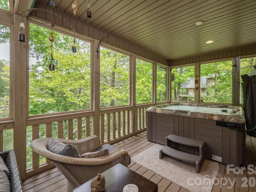149 Hiwassee Road, Lake Toxaway, NC 28747.  MLS# CAR4377735, YatesRealty ID 22821. Hanging out in the tree tops