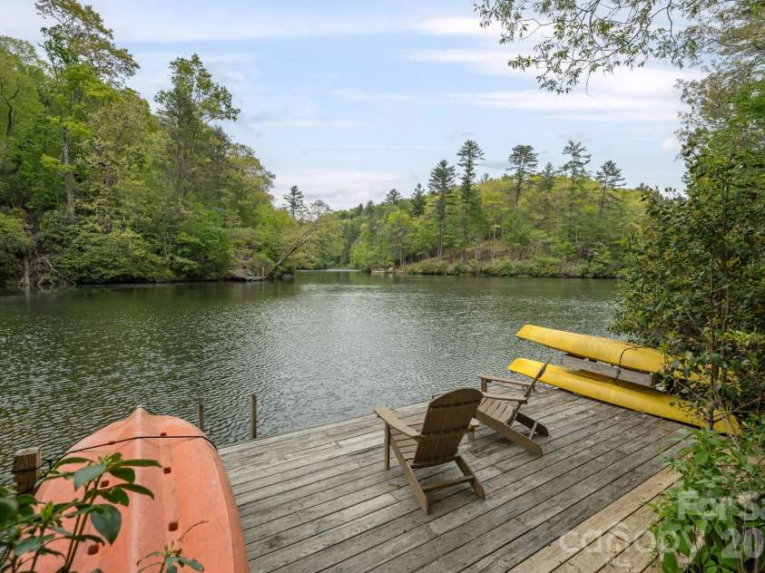 149 Hiwassee Road, Lake Toxaway, NC 28747.  MLS# CAR4377735, YatesRealty ID 22821. Lakefront! Private Dock!