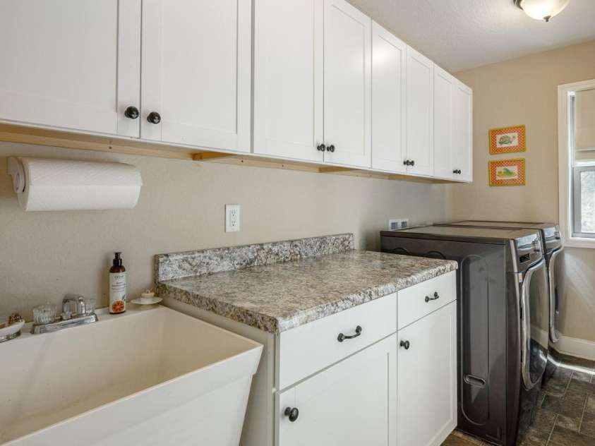 149 Hiwassee Road, Lake Toxaway, NC 28747.  MLS# CAR4377735, YatesRealty ID 22821. Large landry room on main level