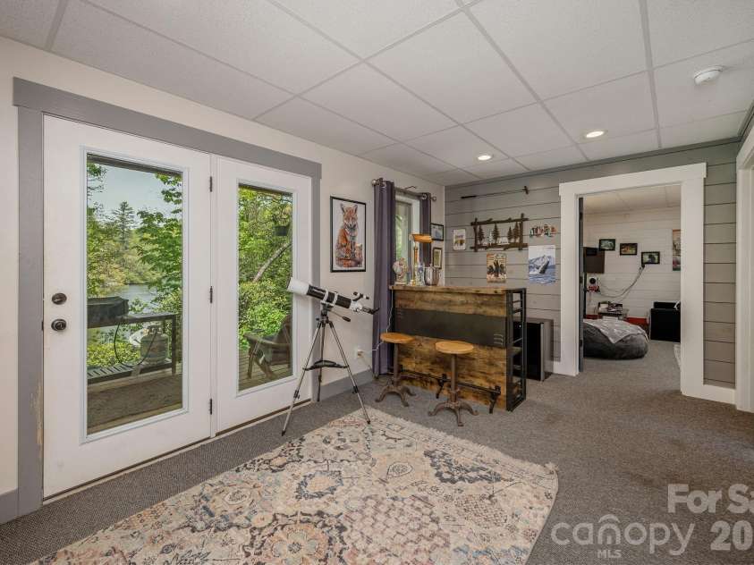 149 Hiwassee Road, Lake Toxaway, NC 28747.  MLS# CAR4377735, YatesRealty ID 22821. Spacious downstairs