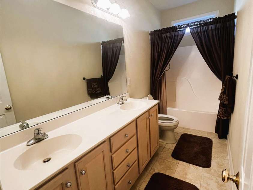 7700 Sedgebrook Drive, Stanley, NC 28164.  MLS# CAR4227336, YatesRealty ID 22821. Hall Bath