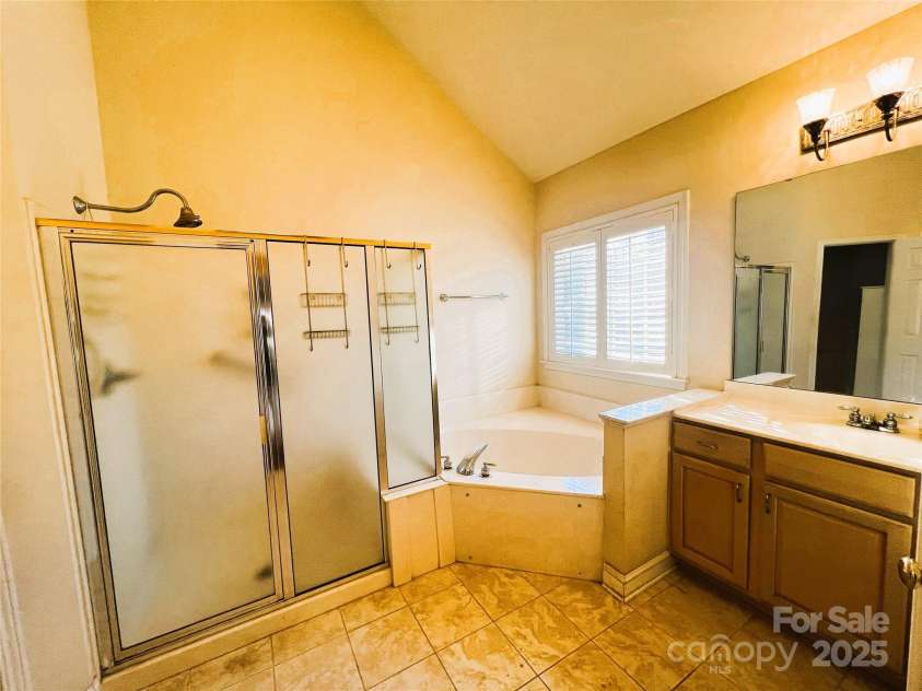 7700 Sedgebrook Drive, Stanley, NC 28164.  MLS# CAR4227336, YatesRealty ID 22821. Primary Bathroom